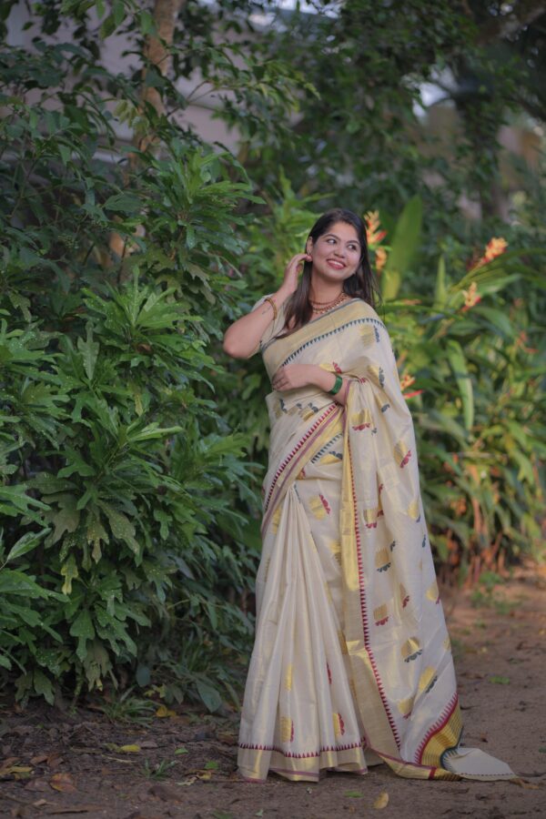 2026/06/1000202870-scaled.jpg Mandara - lotus weave premium kerala tissue saree
