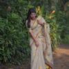 2026/06/1000202874-scaled.jpg Mandara - lotus weave premium kerala tissue saree