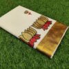 2026/06/1001207796-scaled.jpg lotus golden- embroidered kerala saree