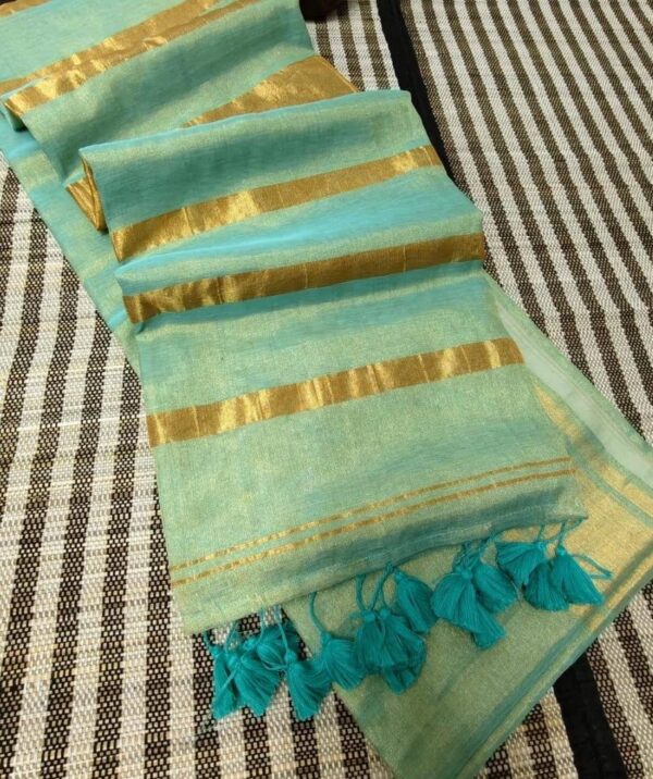 2026/06/1001222395.jpg Aqua blue Swarna Mul cotton tissue saree