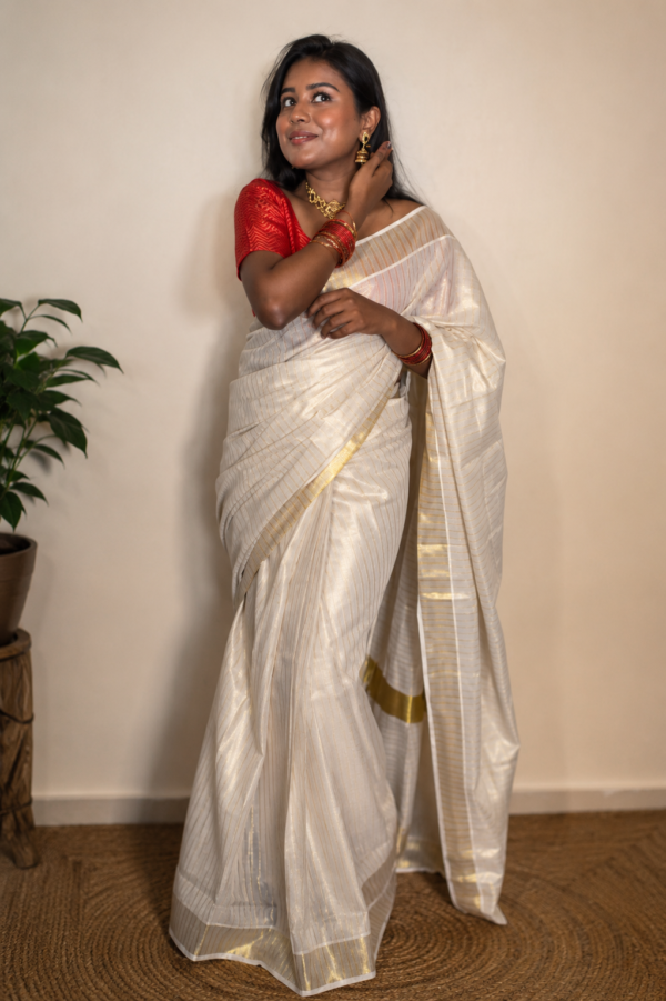 Dharu - Ready to wear Tissue lines kerala saree