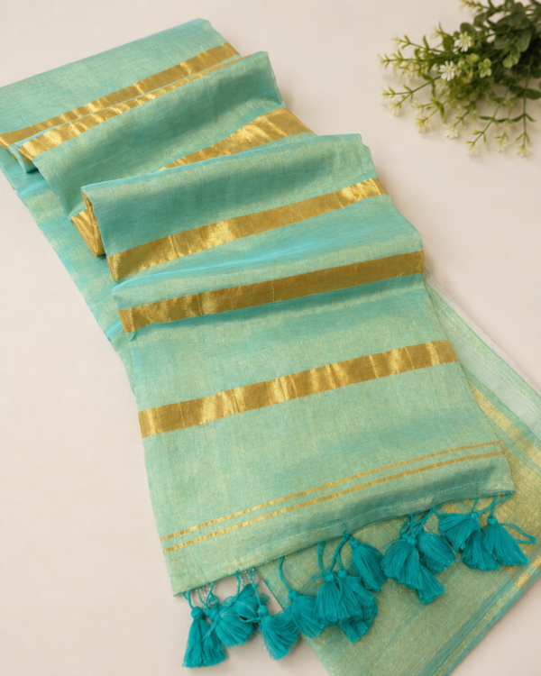 Aqua blue Swarna Mul cotton tissue saree