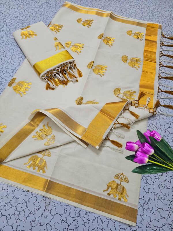 2026/07/1001306732-scaled.jpg Dhwani-004- embroidered kerala saree