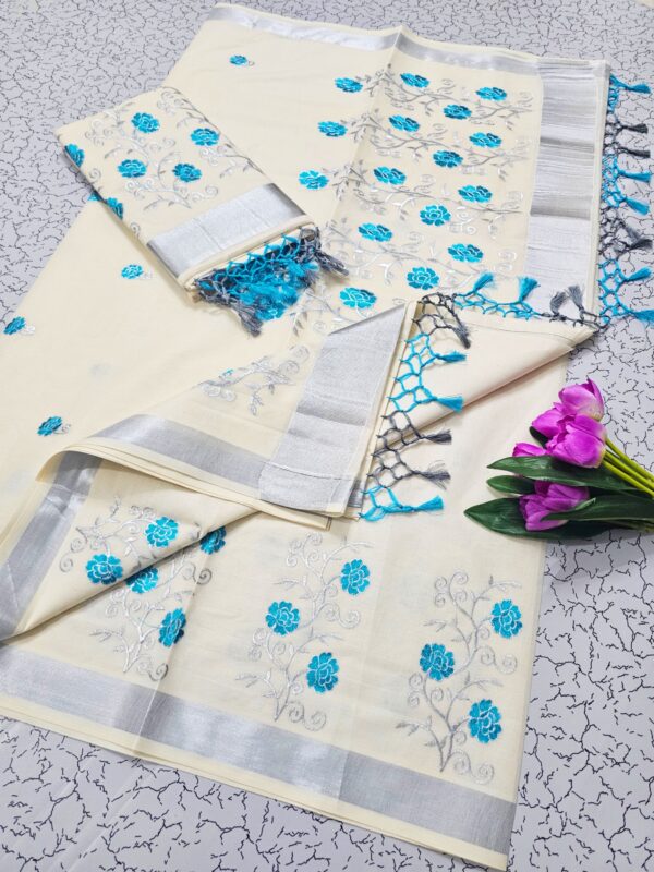 2026/07/1001306758-scaled.jpg Dhwani-001- embroidered kerala saree
