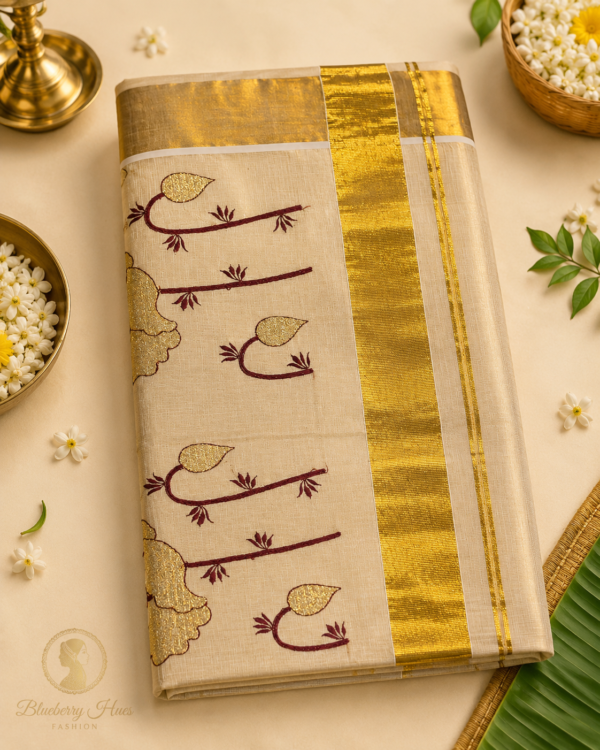 Elegant saree with brass and florals