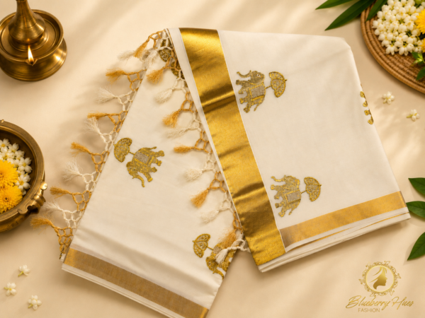 ATHAM – 22: Traditional Kerala Kasavu Saree with Golden Elephant Motifs and Broad Kasavu Border | Premium Onam Collection