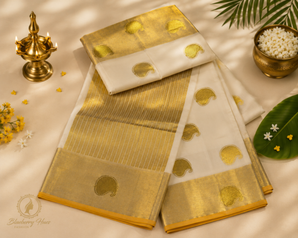 Kasavu-Saree-with-Golden-Butta-Design-1.png ATHAM – 09: Traditional Kerala Kasavu Saree with Golden Butta Design | Premium Onam Collection