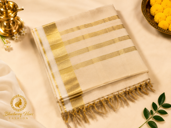 Kasavu Saree with Grand Golden Striped Pallu and Elegant Tassel Finish