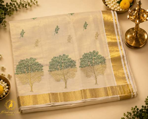 ATHAM – 31: Kerala Kasavu Saree with Green-Gold Tree Embroidery and Broad Golden Border