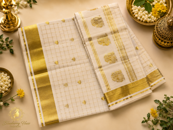 Saree-with-Golden-Checks-and-Ornate-Peacock-Woven-Pallu-1.png ATHAM – 27: Kerala Kasavu Saree with Golden Checks and Ornate Peacock Woven Pallu