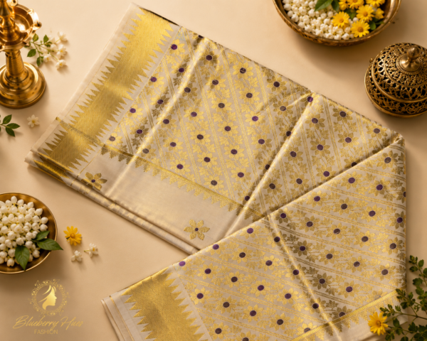 ATHAM – 28: Premium Kerala Kasavu Saree with Golden Floral Zari Weaving & Purple Motifs | Onam Collection